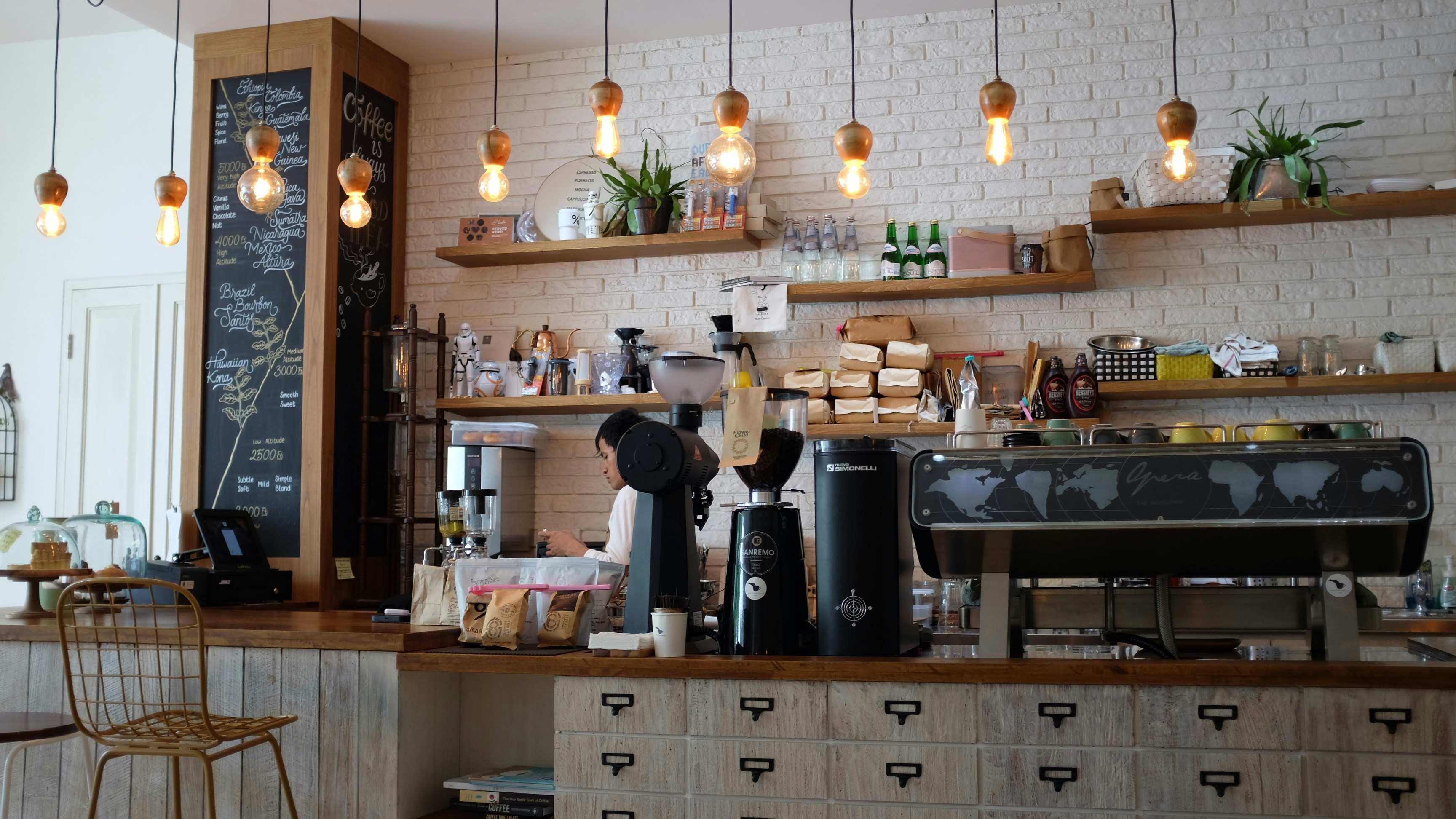 Modern coffee shop counter with professional equipment
